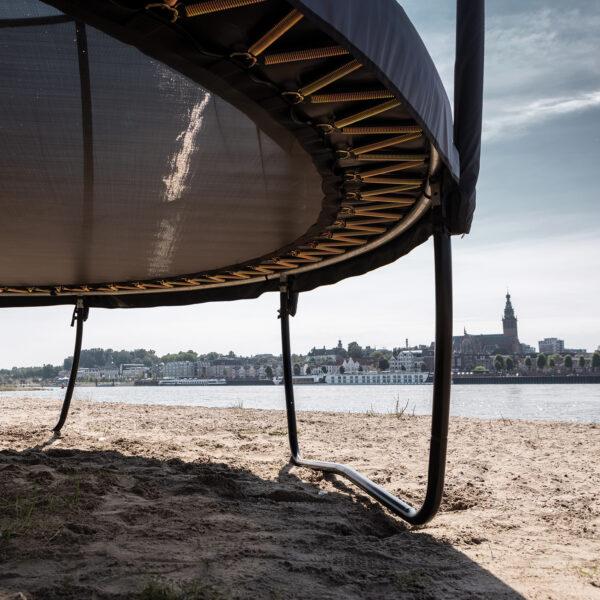 Super strong frame of the BERG Elite trampoline on the beach