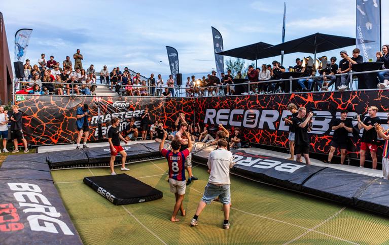 Athletes celebrate their performance at the BERG Pro 9 Record Breakers event with an audience